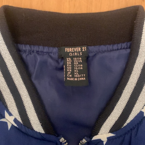 Blue and white star bomber jacket. Silver detailing. - Picture 2 of 3